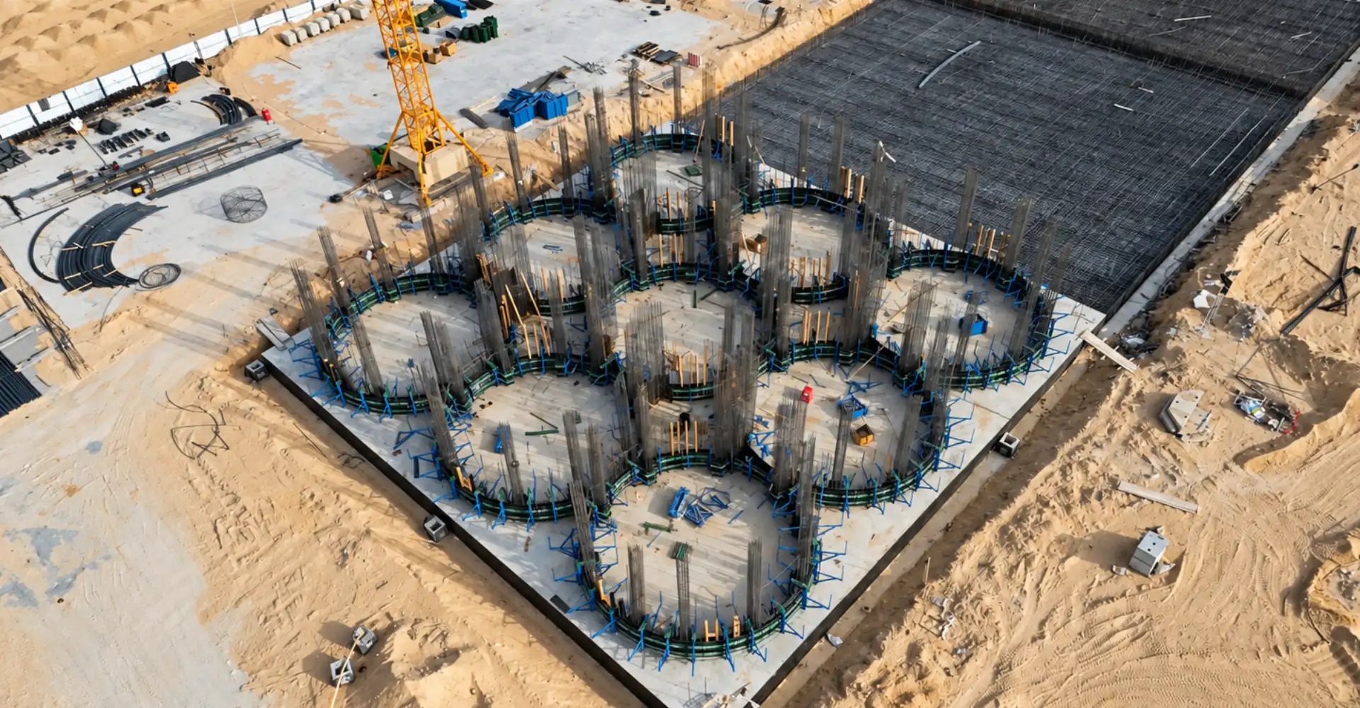 Slipform construction of nine-cell reinforced-concrete grain silos in Algeria